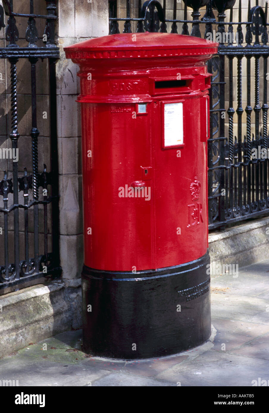 Red oval post box in London Stock Photo