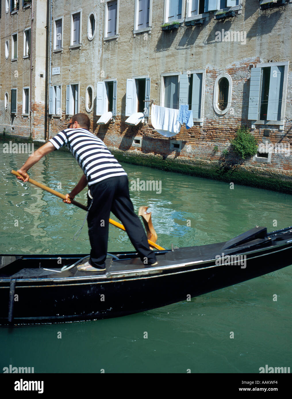 gondolieri rowing Venice Italy Europe. Photo by Willy Matheisl Stock Photo