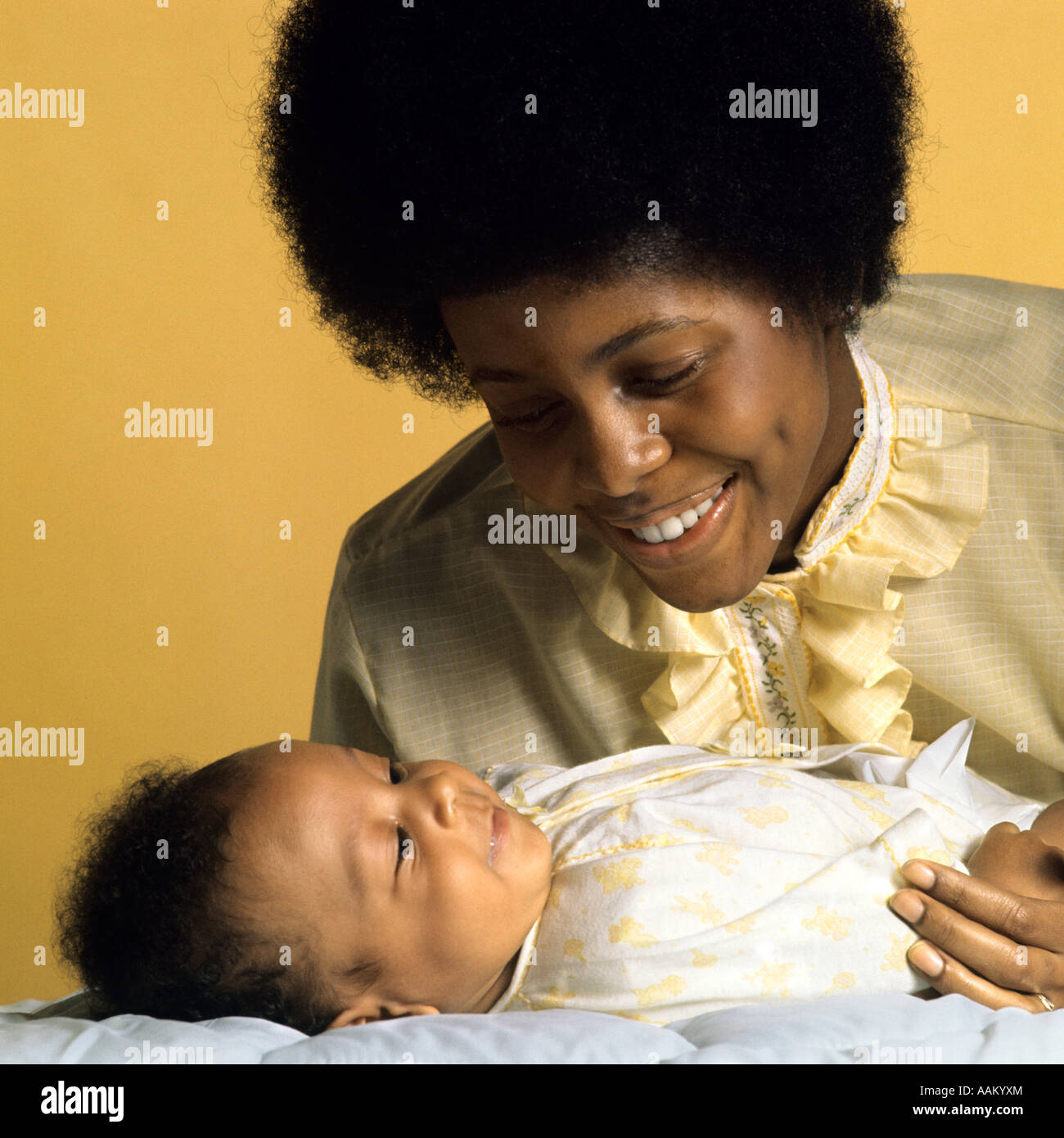 1970s Smiling African American Mother With Her Infant Baby Boy
