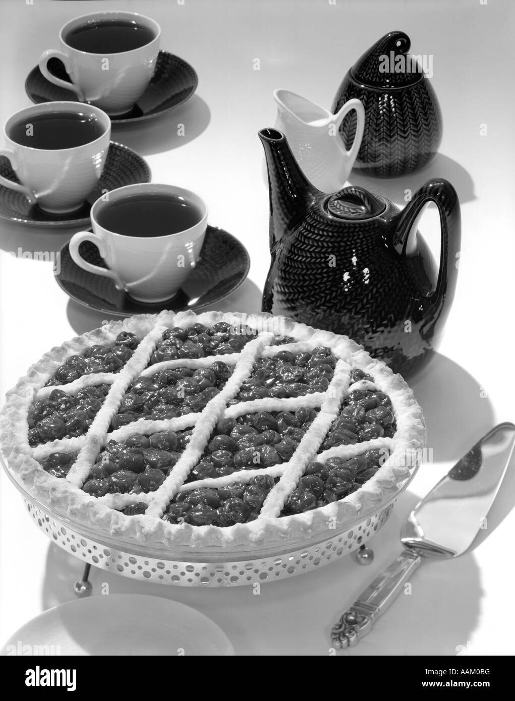 1950s CHERRY PIE DESSERT WITH 3 CUPS OF COFFEE Stock Photo Alamy