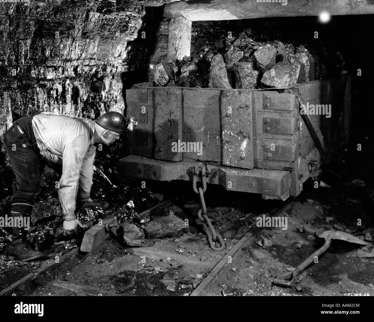 COAL MINER MINING HARD HAT WORKER Stock Photo