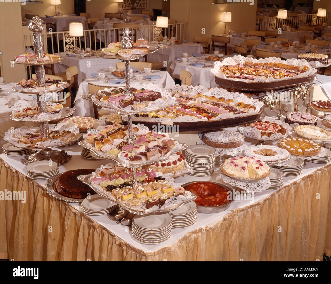 1960s STILL LIFE OF BUFFET CAKES PASTRIES DESSERTS Stock Photo 1960s-still-life-of-buffet-cakes-pastries-desserts-stock-photo
