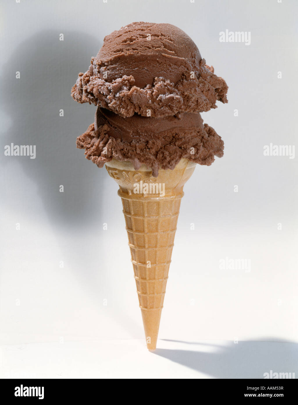 TWO SCOOPS CHOCOLATE ICE CREAM CONE Stock Photo