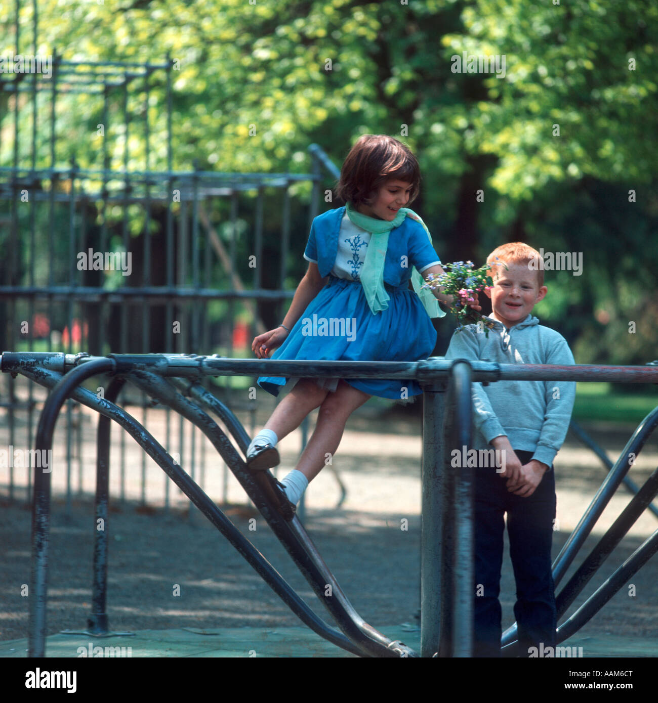 1960s boy girl playground hi-res stock photography and images - Alamy