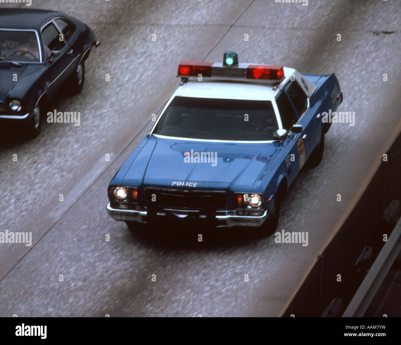 1970s BLUE AND WHITE PHILADELPHIA POLICE CAR ON HIGHWAY FROM ABOVE Stock Photo