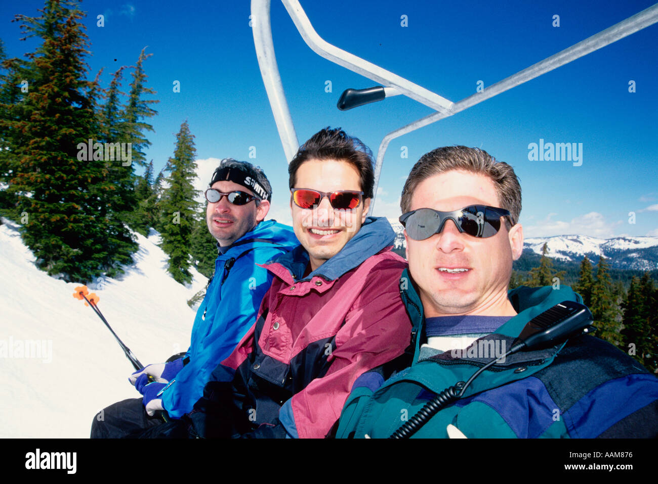 Skiiers Riding A Chair Lift At Mammoth Mountain California