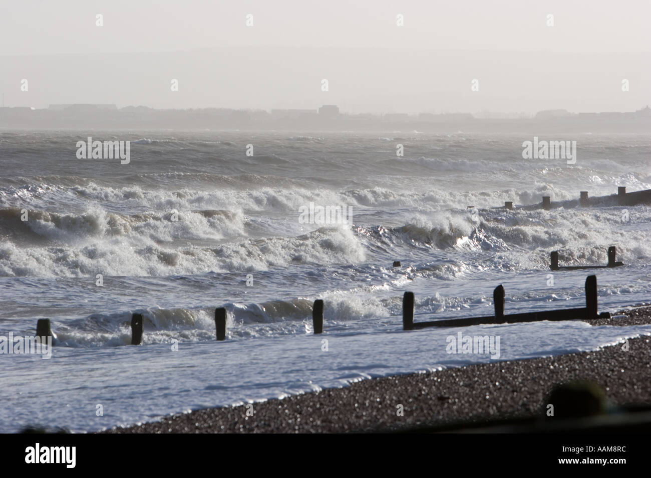 Groynes and rough seas at Norman's Bay in East Sussex Stock Photo Alamy