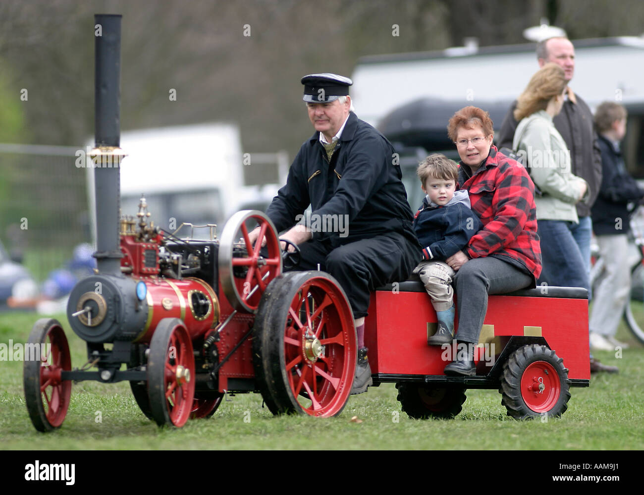 Steam up at Wollaton Hall boy aged four gets a ride on a 1/3 scale traction engine Stock Photo