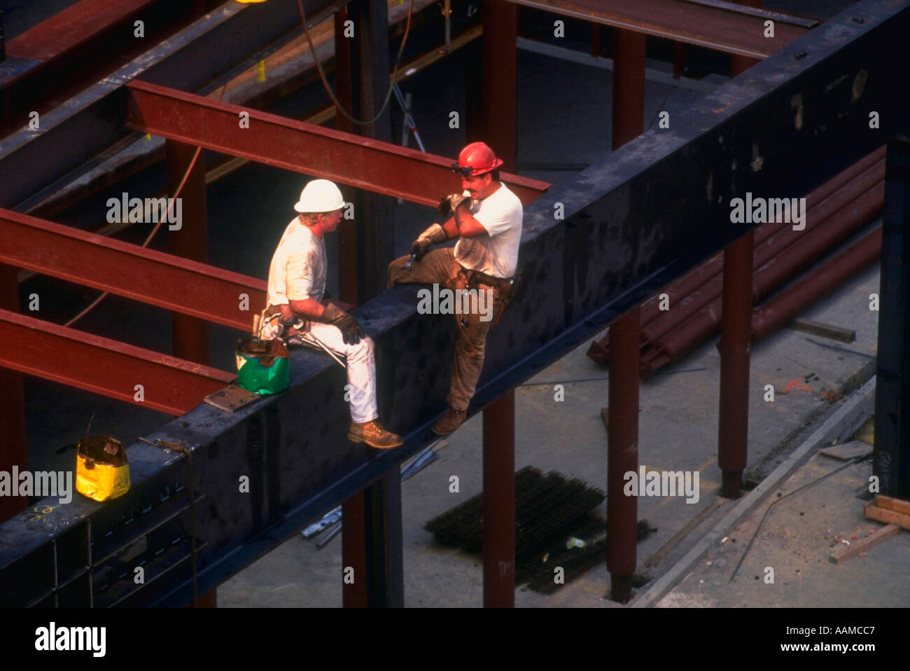 Steel workers on beam Stock Photo Alamy