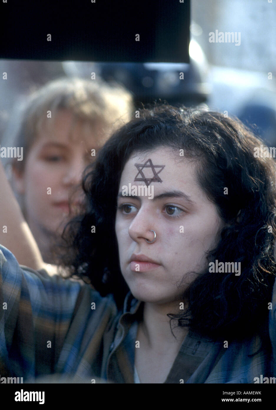 Demonstrator with star of David at KKK rally Stock Photo