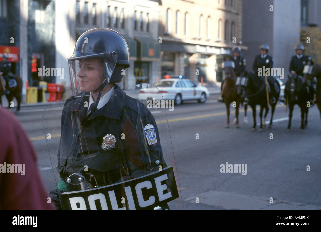 Policewoman. Columbus Ohio  in riot gear during Ku Klux Klan rally Stock Photo