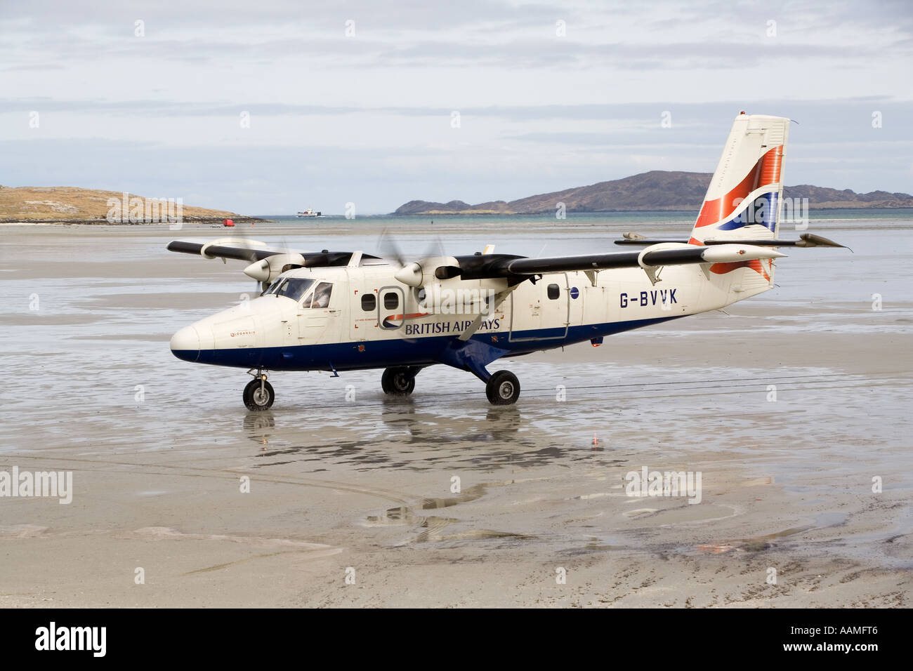 UK Scotland Western Isles Outer Hebrides Barra BA aircraft on Traigh Mhor beach Stock Photo