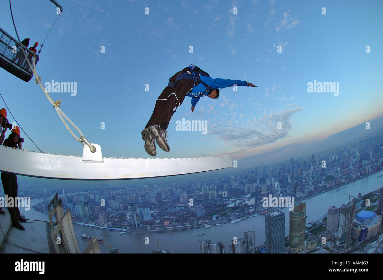 BASE Jump in Shanghai at sunrise aerobatic Stock Photo