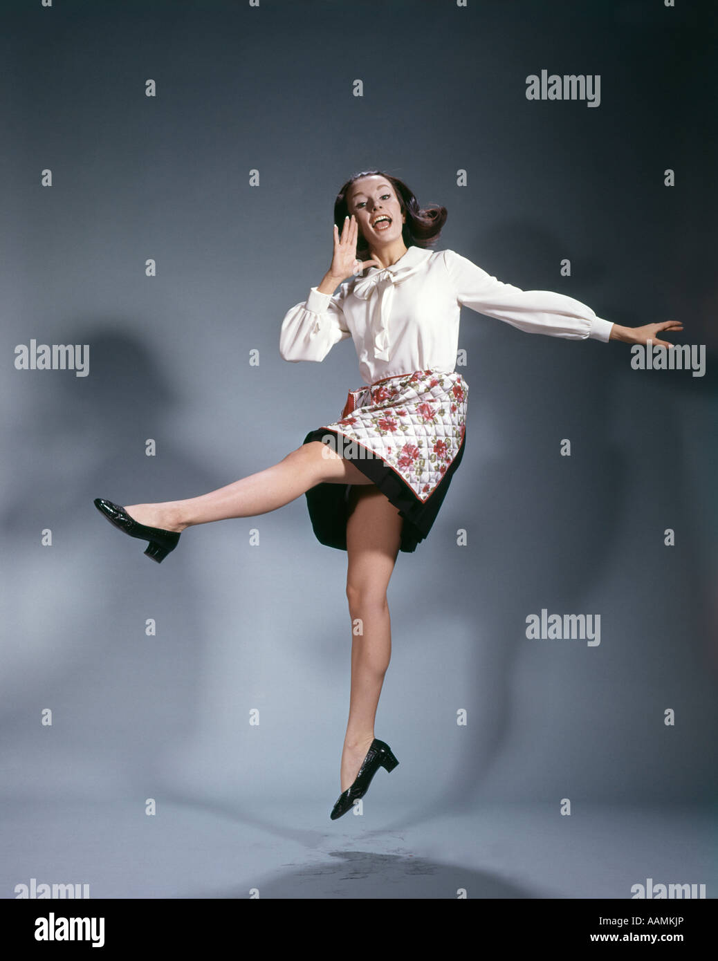 Happy woman kicking air hires stock photography and images Alamy