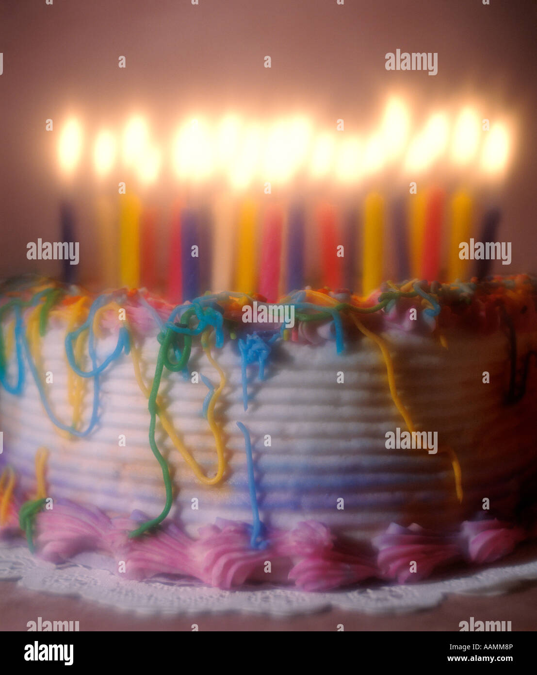 LIGHTED CANDLES ON BIRTHDAY CAKE Stock Photo Alamy