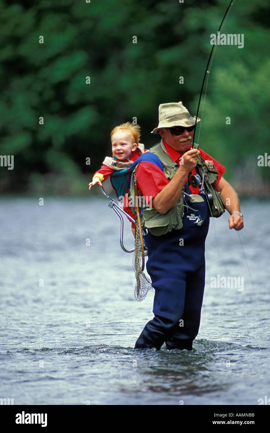https://c8.alamy.com/comp/AAMNBB/idaho-dad-and-son-fly-fishing-in-the-big-wood-river-sun-valley-AAMNBB.jpg