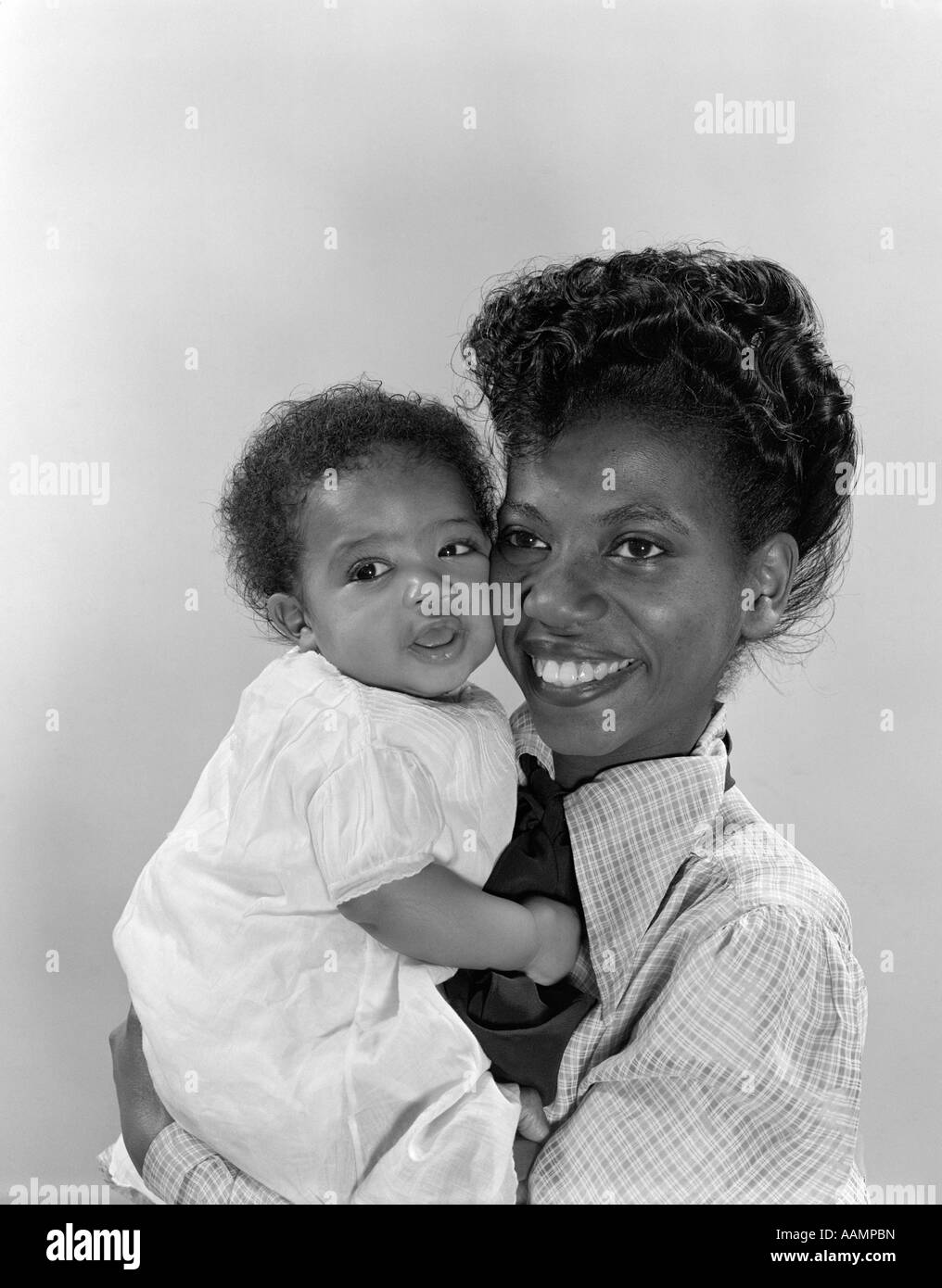 1950s African American Mother Holding Baby Stock Photo 12664424
