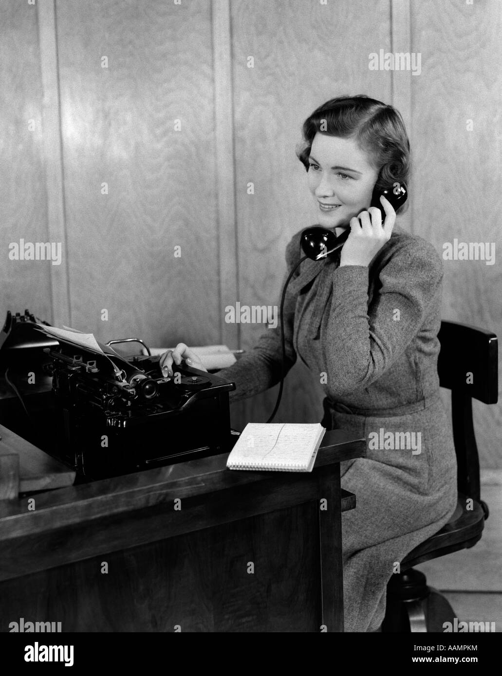 1940s Smiling Young Woman Secretary Receptionist Sitting At Office