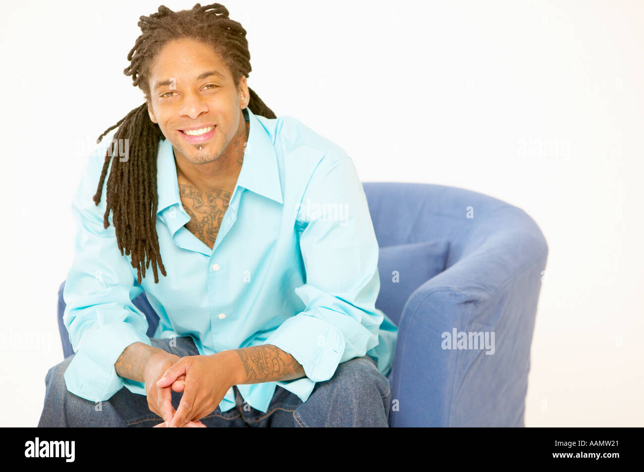 Studio portrait man chair hi-res stock photography and images - Alamy