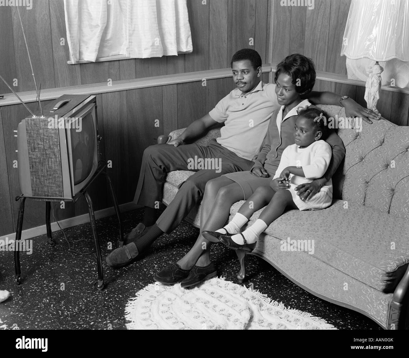 1970s AFRICAN AMERICAN FAMILY WATCHING PORTABLE TELEVISION MOTHER ...