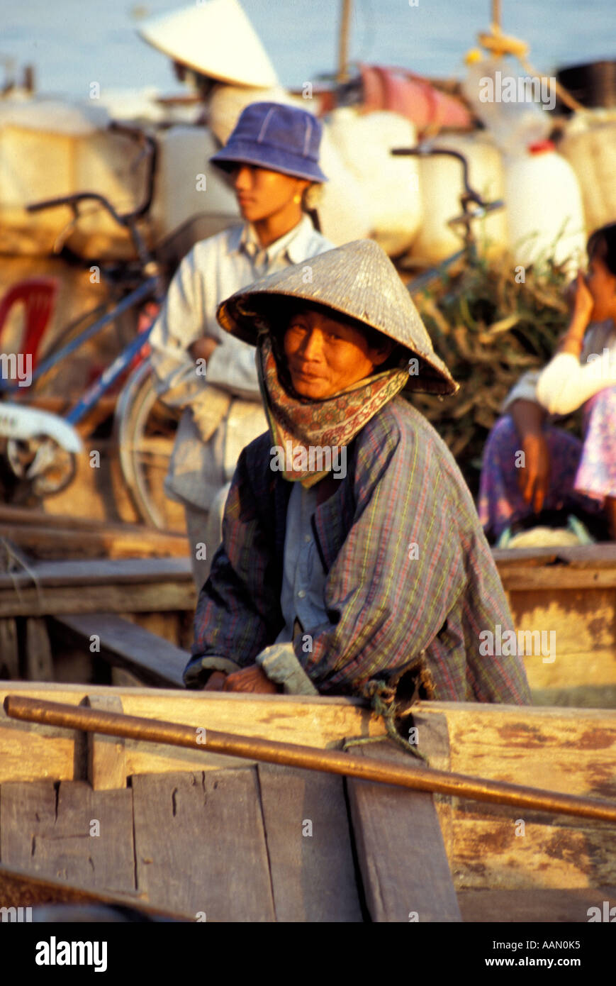 Woman on boat waiting for departure, Hoi An, Vietnam Stock Photo