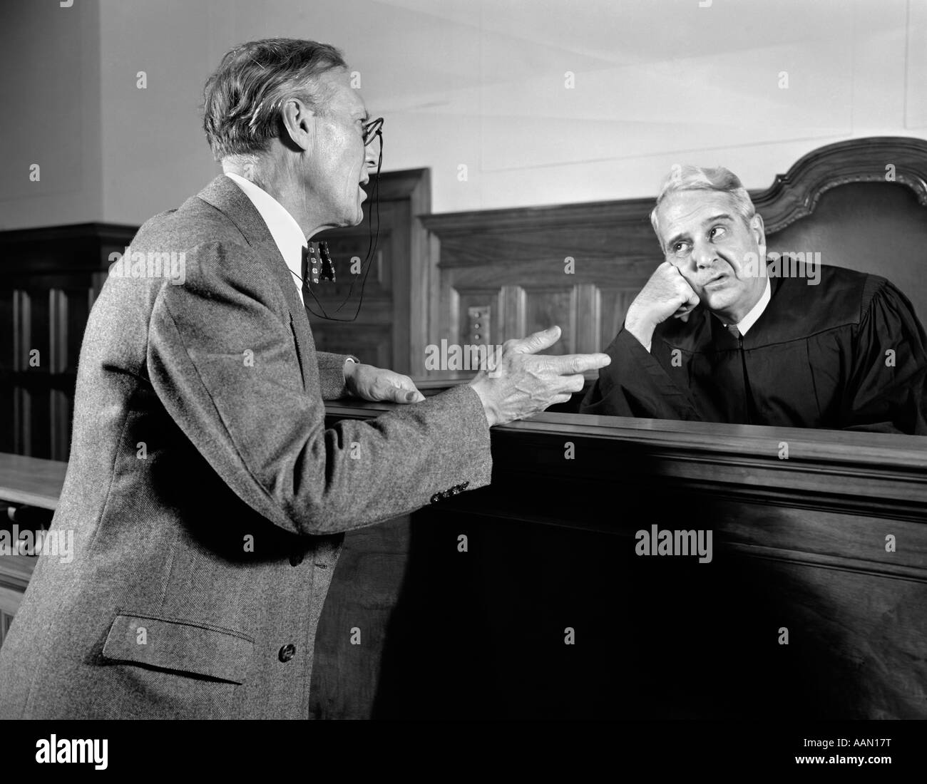 1940s ATTORNEY LAWYER AT BENCH PLEADS POINT EXPLAIN TO IMPATIENT BORED 1940s ATTORNEY LAWYER AT BENCH PLEADS POINT EXPLAIN TO IMPATIENT BORED