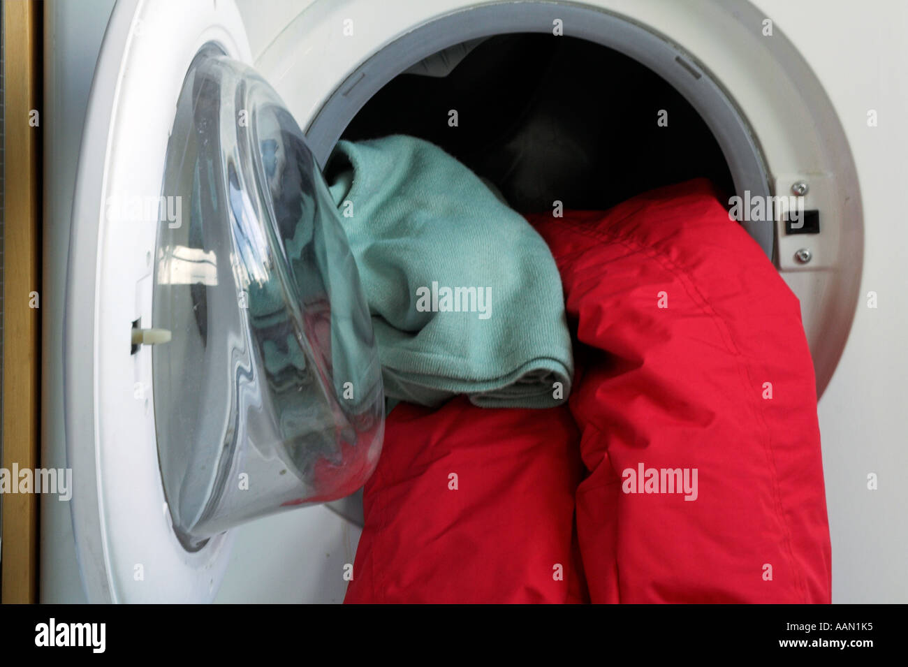 Red And Green Washing In Washing Machine Stock Photo Alamy