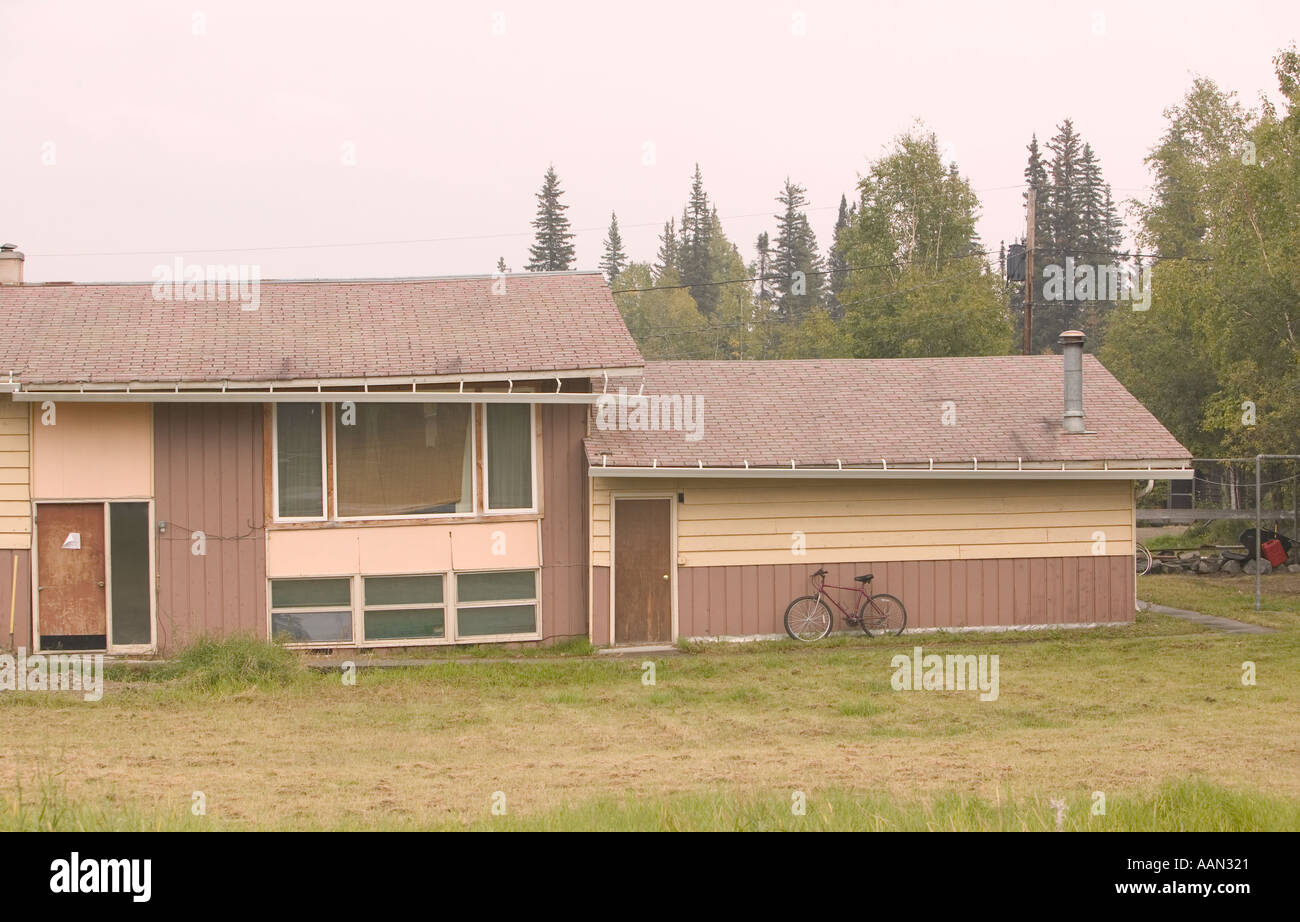 house collapsing due to global warming induced permafrost melt Madcap Lane Fairbanks Alaska USA Stock Photo