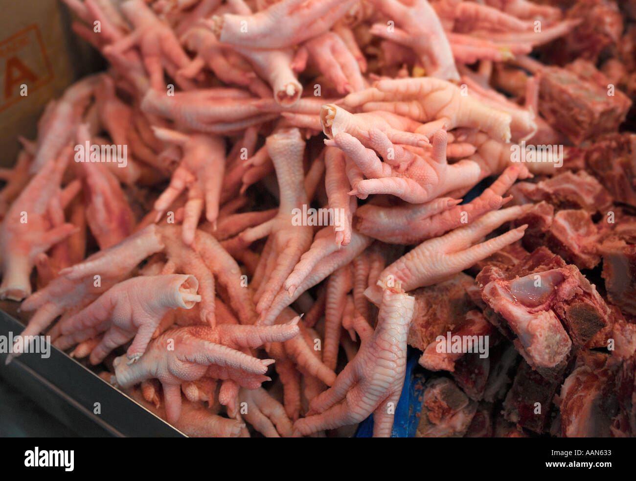 Chicken feet on a Chinese market stall in Hong Kong Stock Photo - Alamy