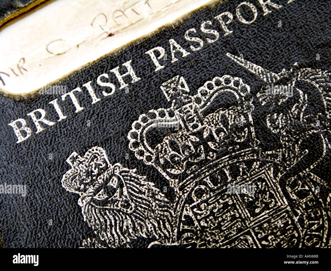 AN OLD STYLE WORN BRITISH PASSPORT Stock Photo