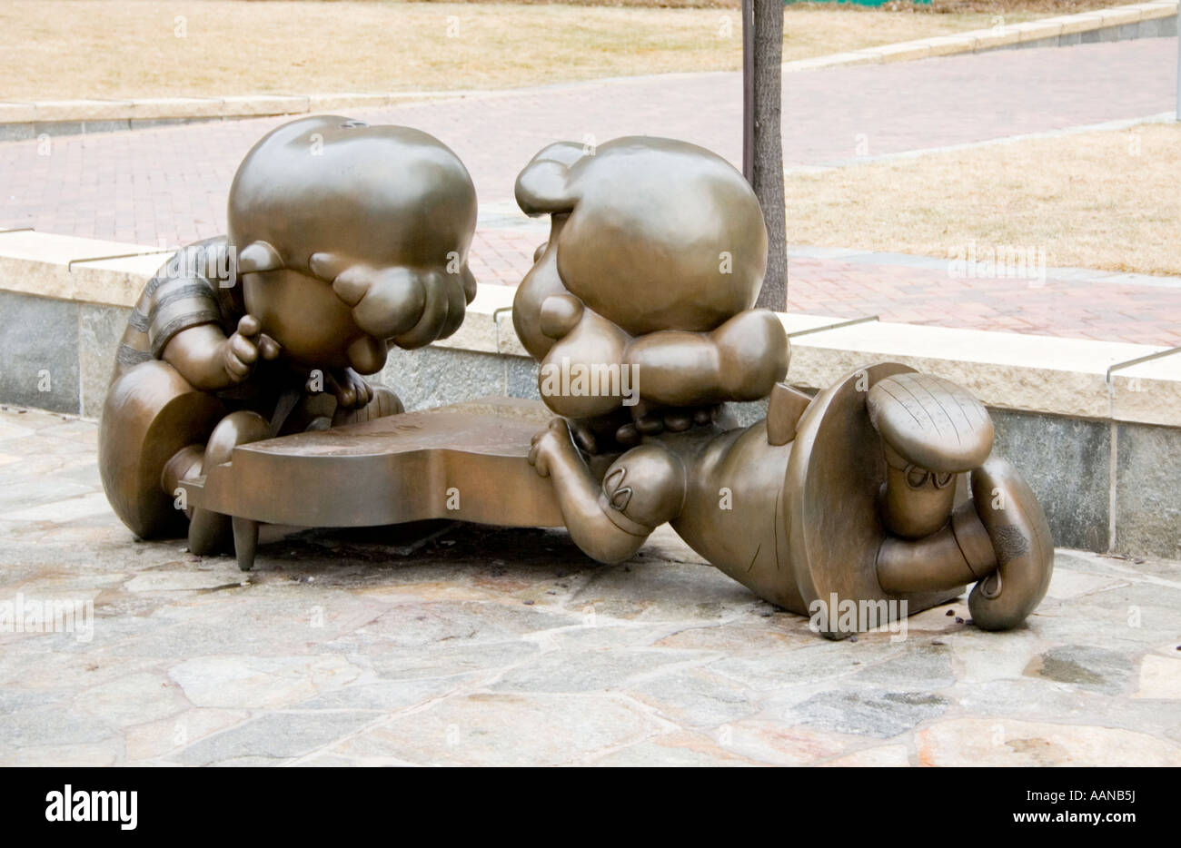 Sculpture of Peanuts characters Lucy and Schroeder. Wells Fargo WinterSkate St Paul Minnesota USA Stock Photo