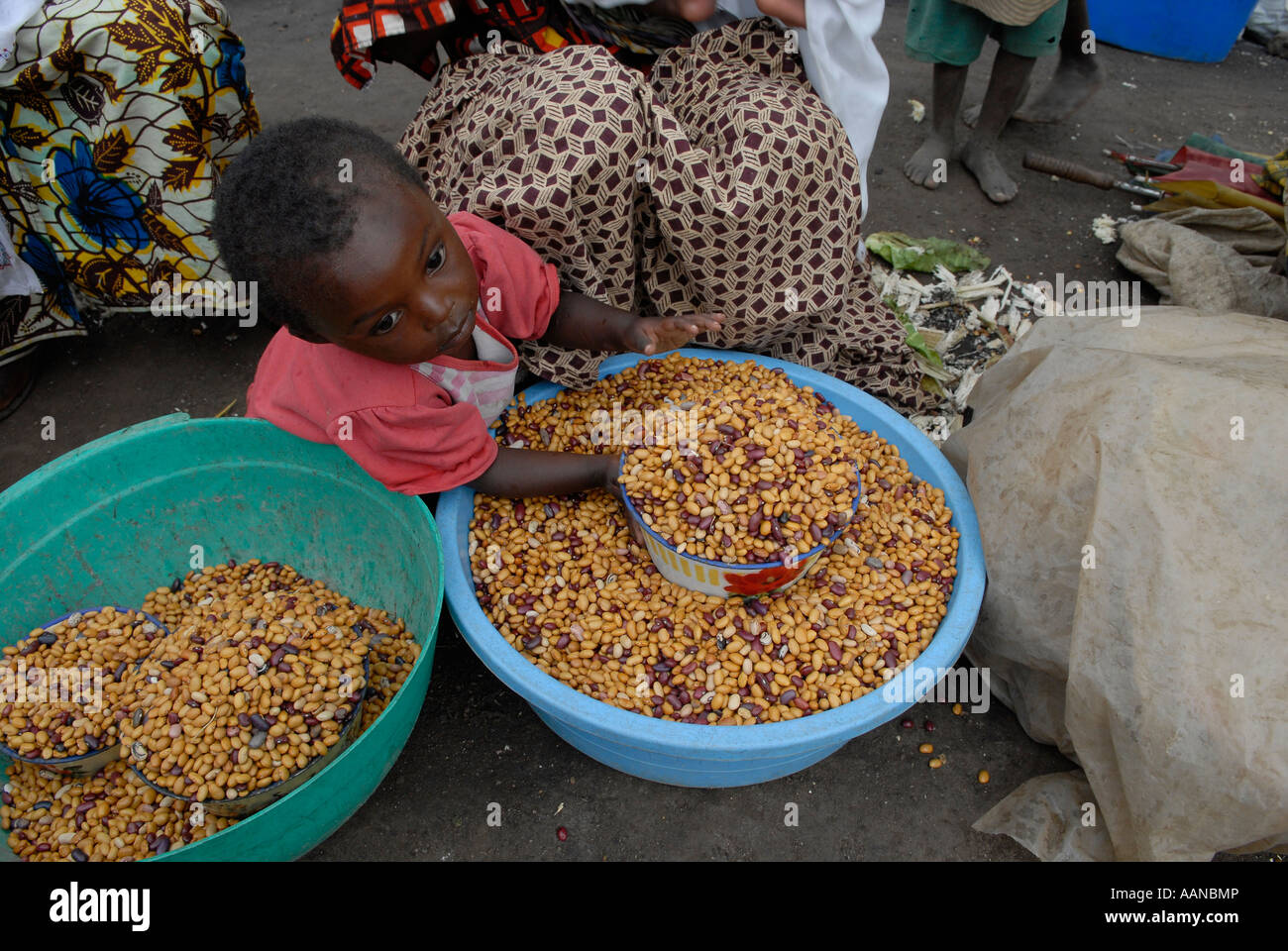 Young Congolese girl selling beans in the market in Goma North Kivu province, DR Congo Africa Stock Photo