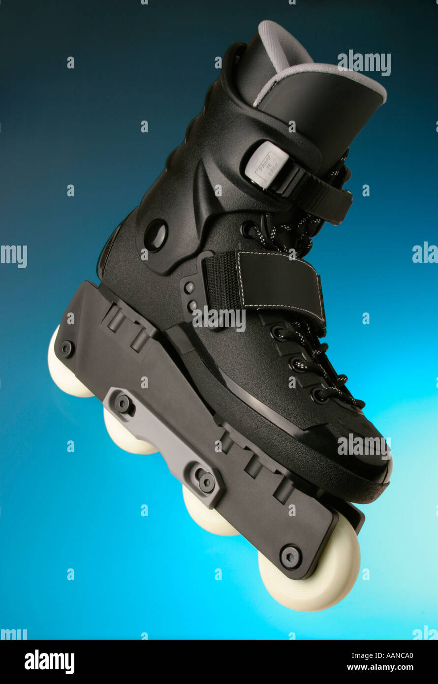 Roller Blade on blue background Stock Photo Alamy