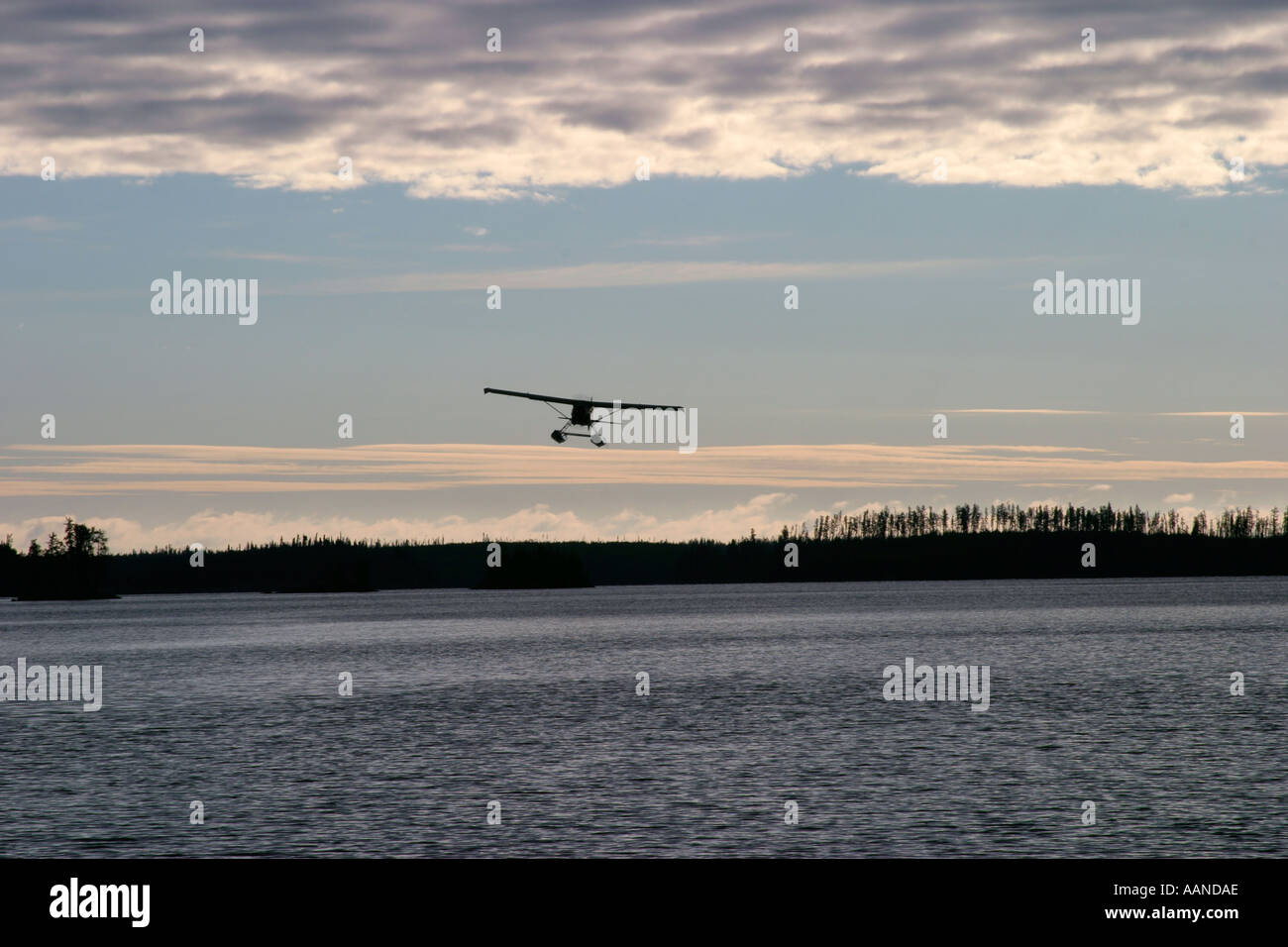 Pontoon Plane over Lake Stock Photo - Alamy