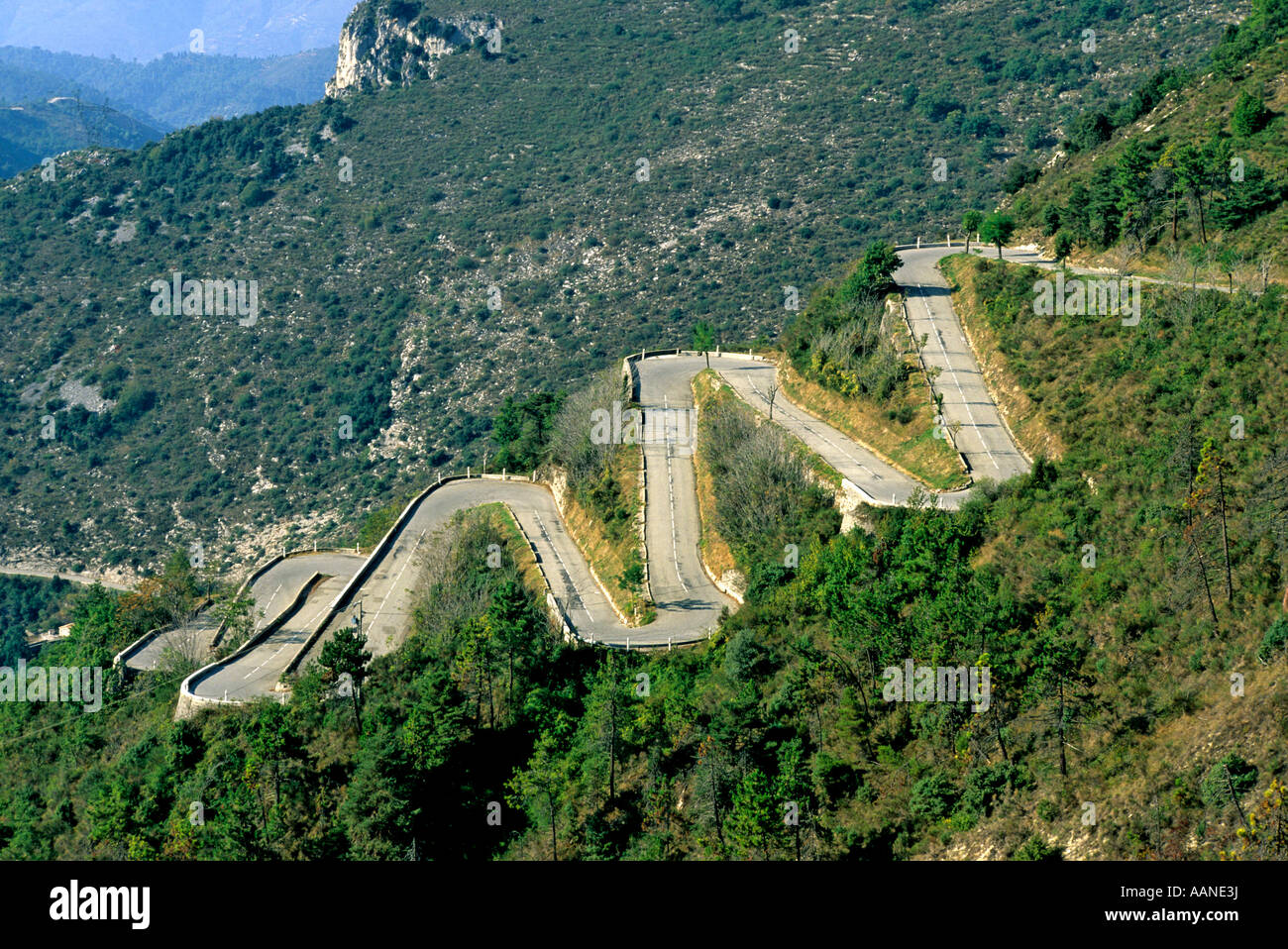 Mountain road with bends in hairpins in Alpes Maritimes, France, Europe Stock Photo