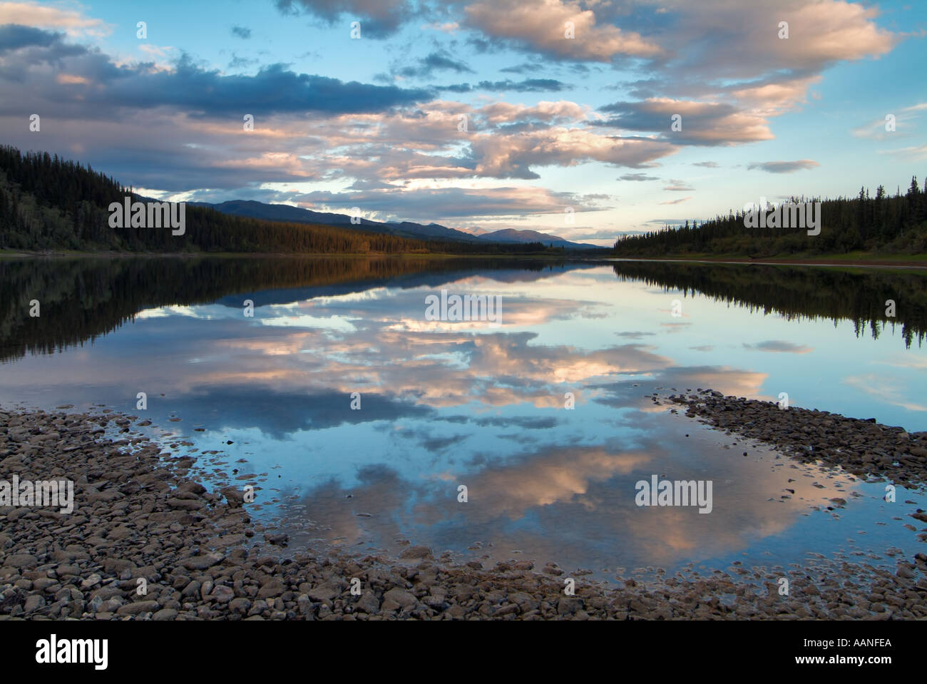 Sunset over the Teslin River near the 30mile narrows section, Yukon, Canada Stock Photo