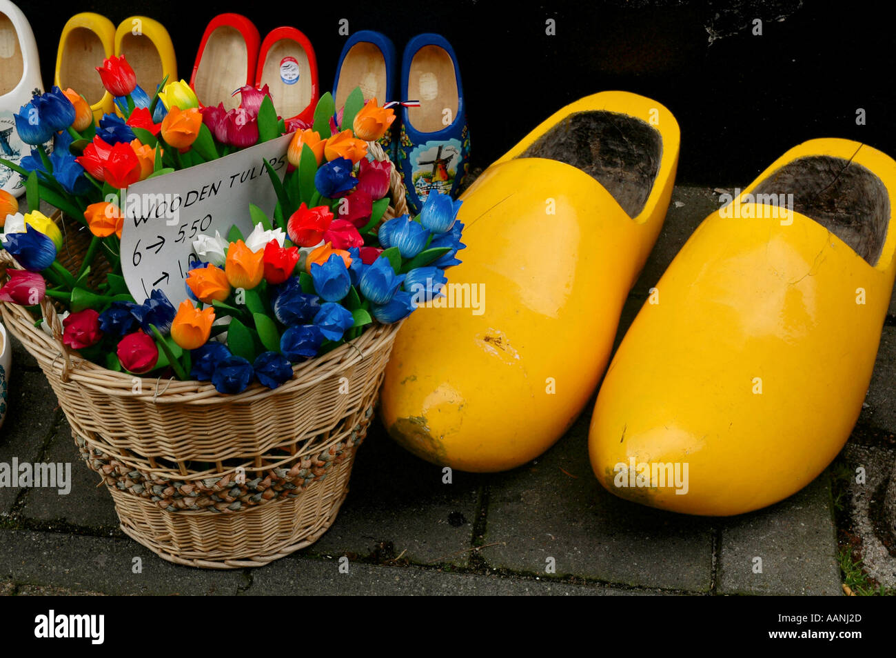HOLLAND Display of Clogs and flower basket Stock Photo