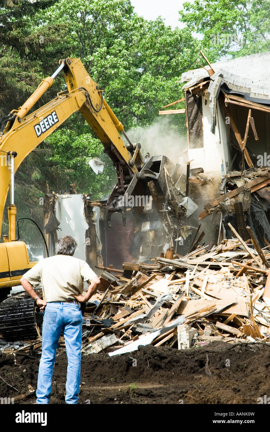 the-demolition-of-a-wood-frame-house-to-make-room-for-commercial