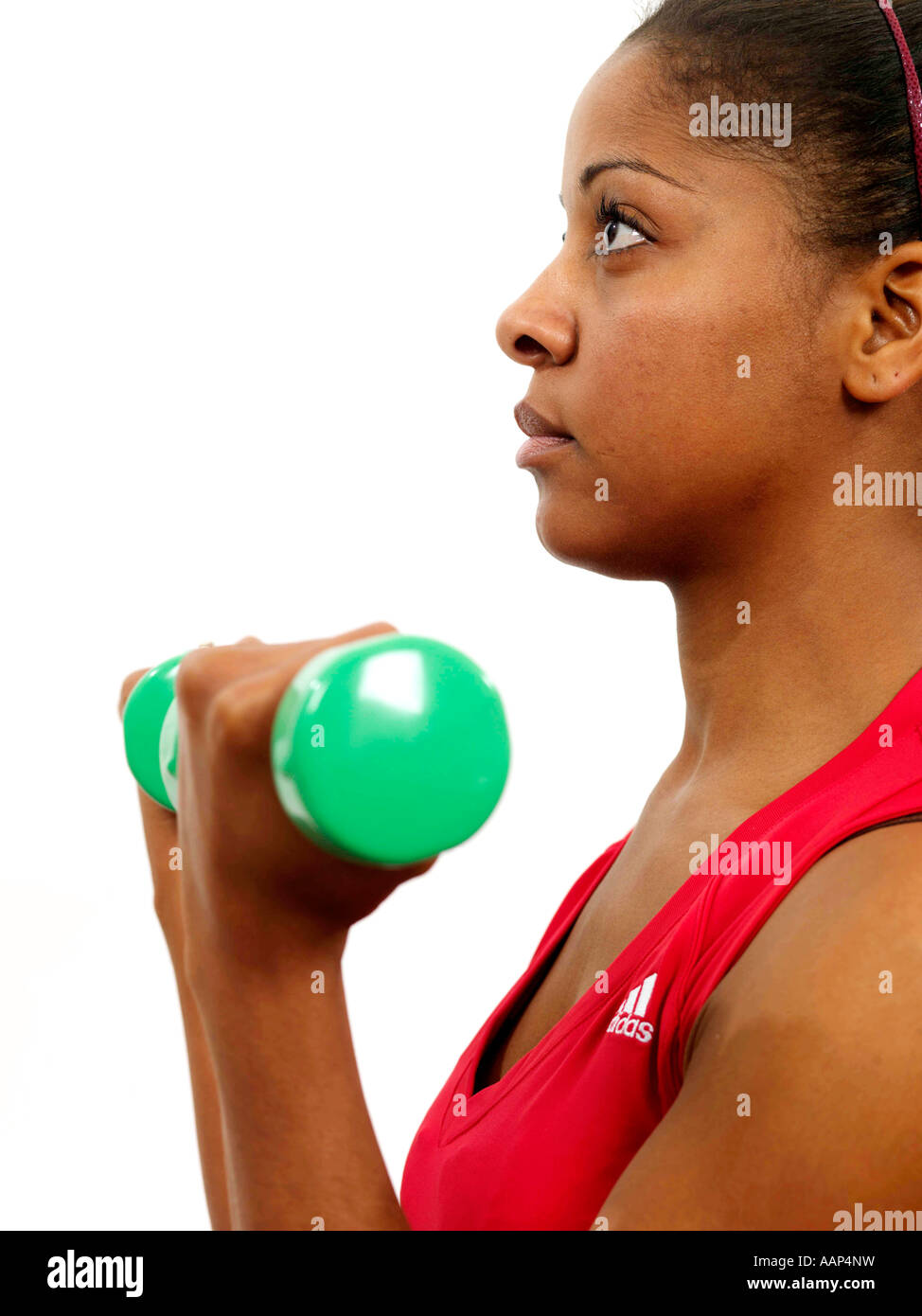 Young Woman Lifting Weights Model Released Stock Photo - Alamy