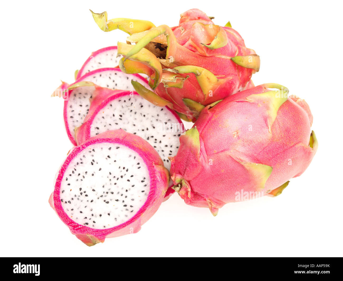Fresh Ripe Tropical Dragon Fruit In Slices Or Sliced Open Isolated Against A White Background With No People And A Clipping Path Stock Photo