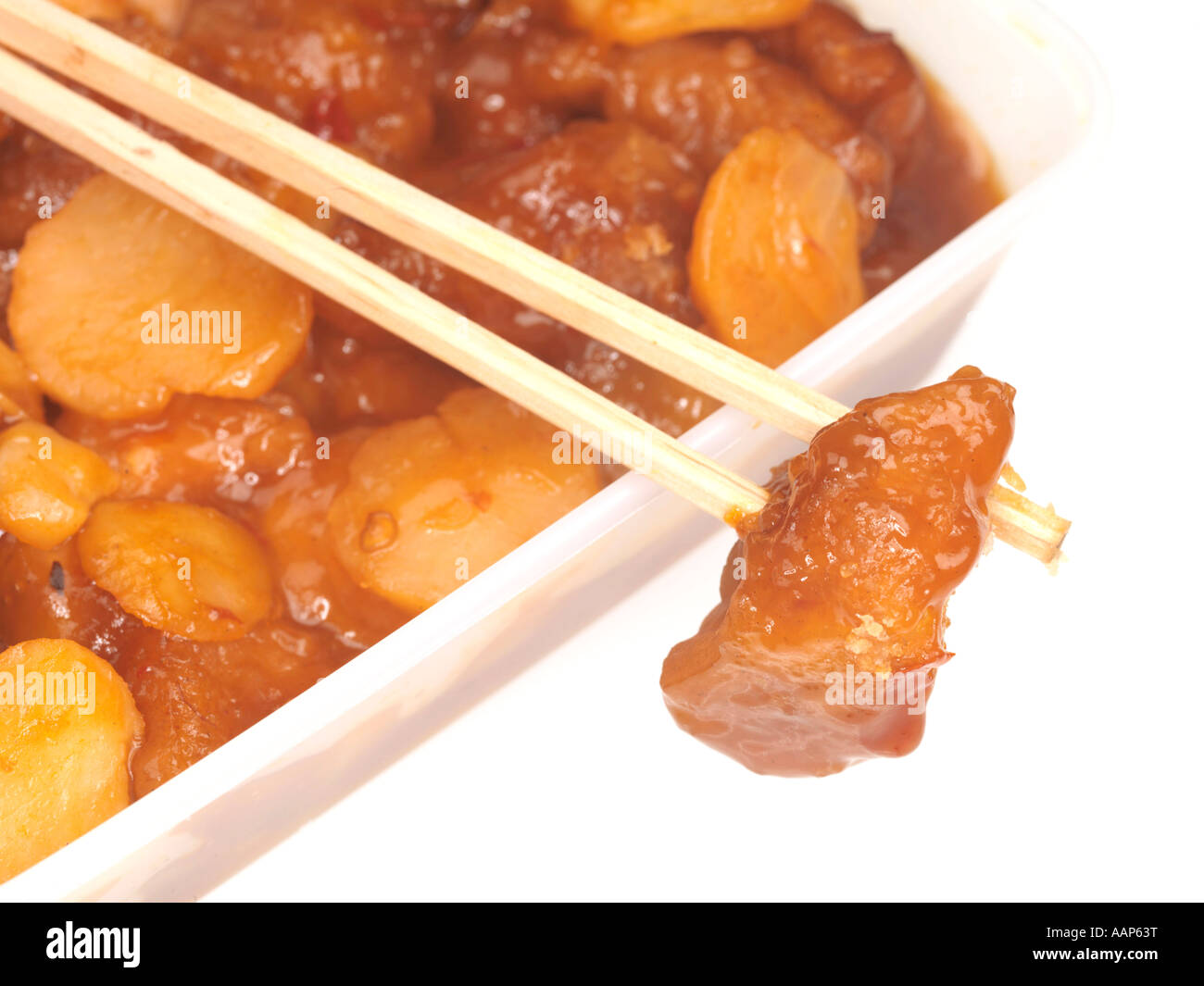 Chinese Sweet and Sour Chicken Takeaway Meal Isolated Against A White
