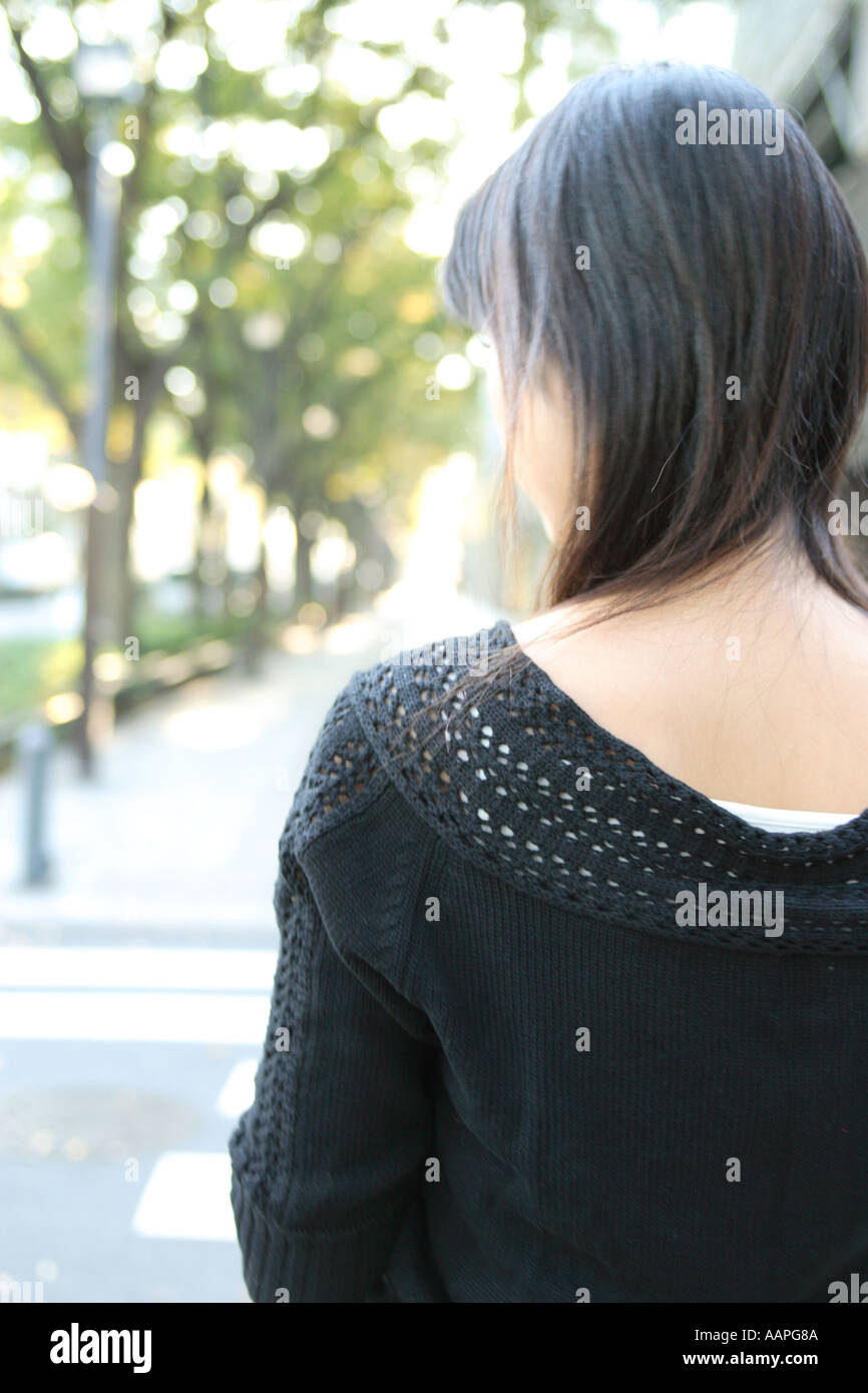Back view asian woman walking hi-res stock photography and images - Alamy