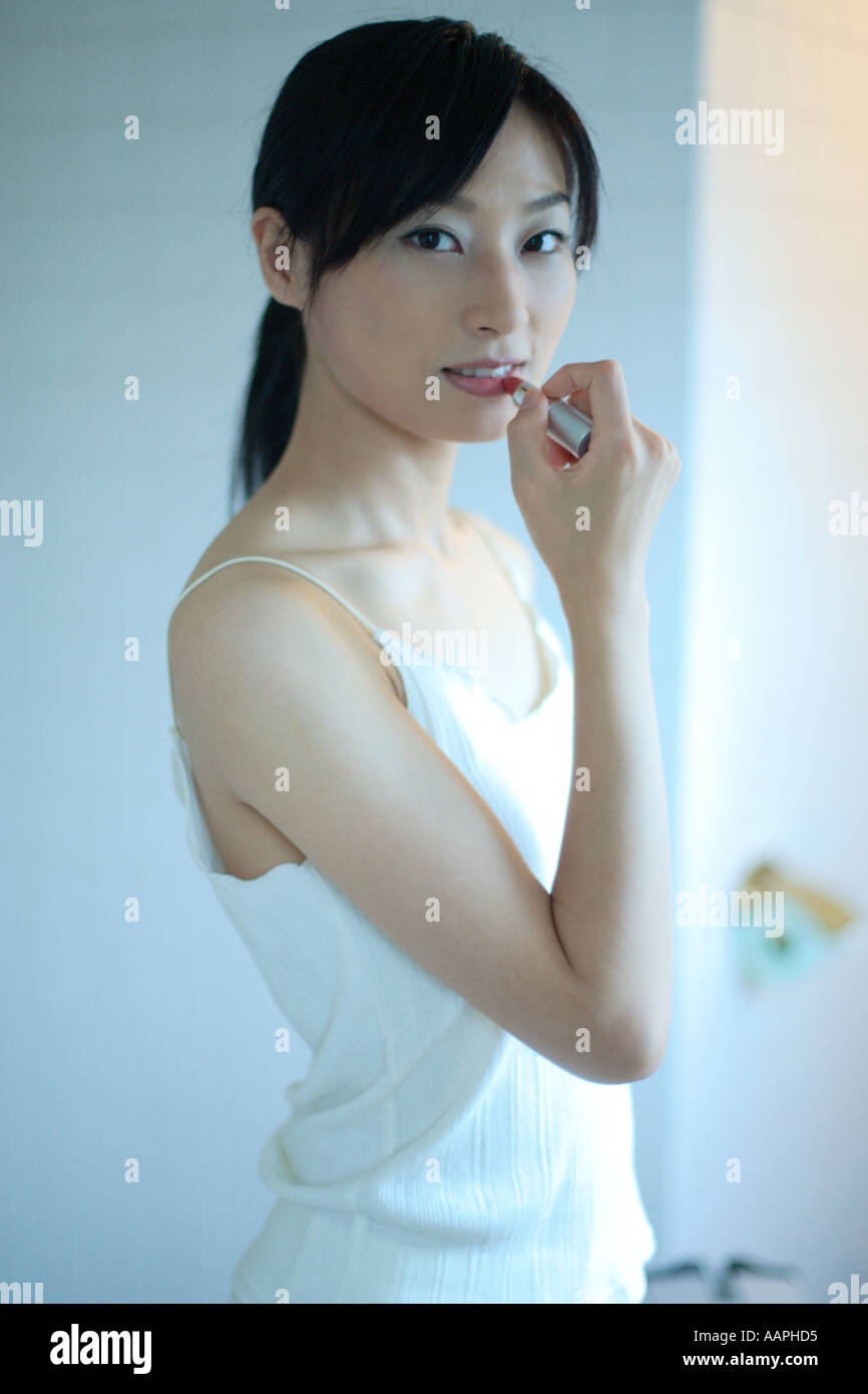 A young woman wearing lipstick Stock Photo