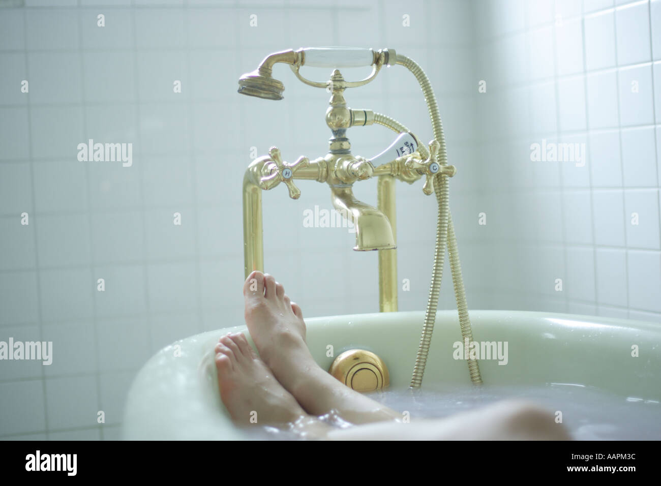 Woman's legs in bathtub Stock Photo Alamy