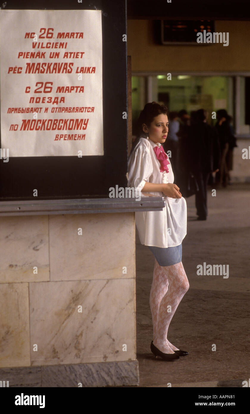 Riga Latvia 1980s A Baltic State country part of the USSR. A teen girl at  the central railway station the sign is in Russian and Latvian 1989 Stock  Photo - Alamy