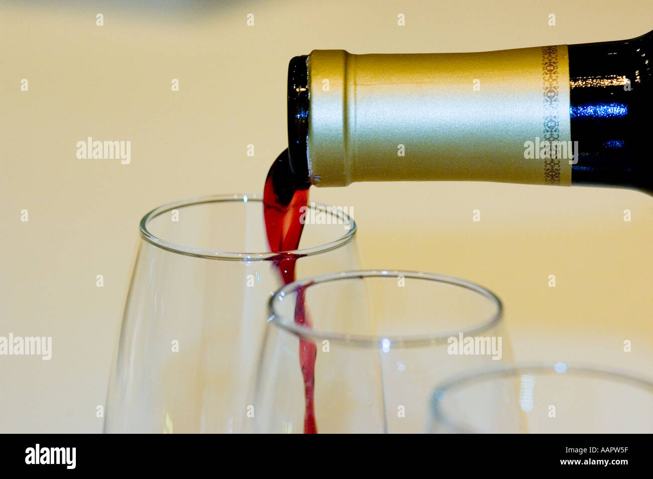 Wine, Pouring red wine Stock Photo