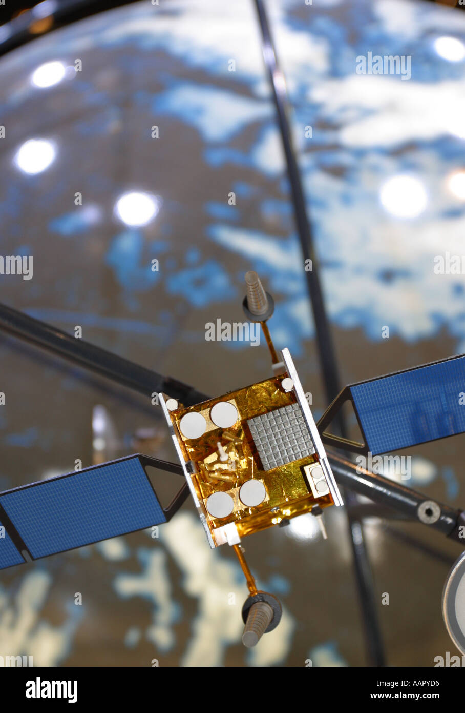 Model of communication satellite orbiting the Earth Stock Photo Alamy