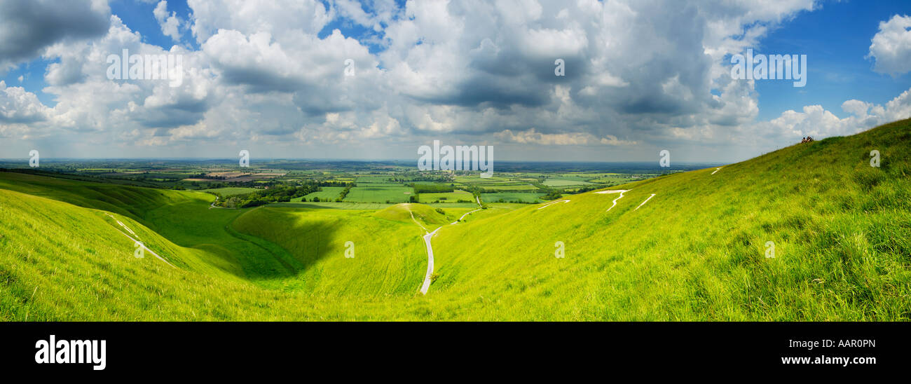 Panoramic view from Whitehorse Hill overlooking The Manger, Dragon Hill and the Uffington White Horse. Uffington, Oxfordshire, England. Stock Photo