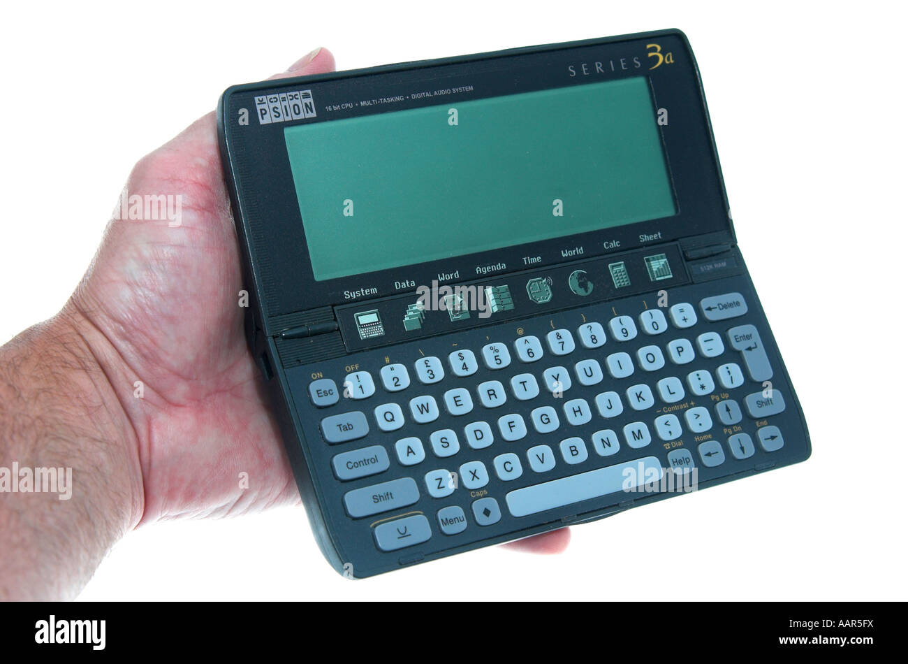hand holding Psion computer keyboard and screen Stock Photo