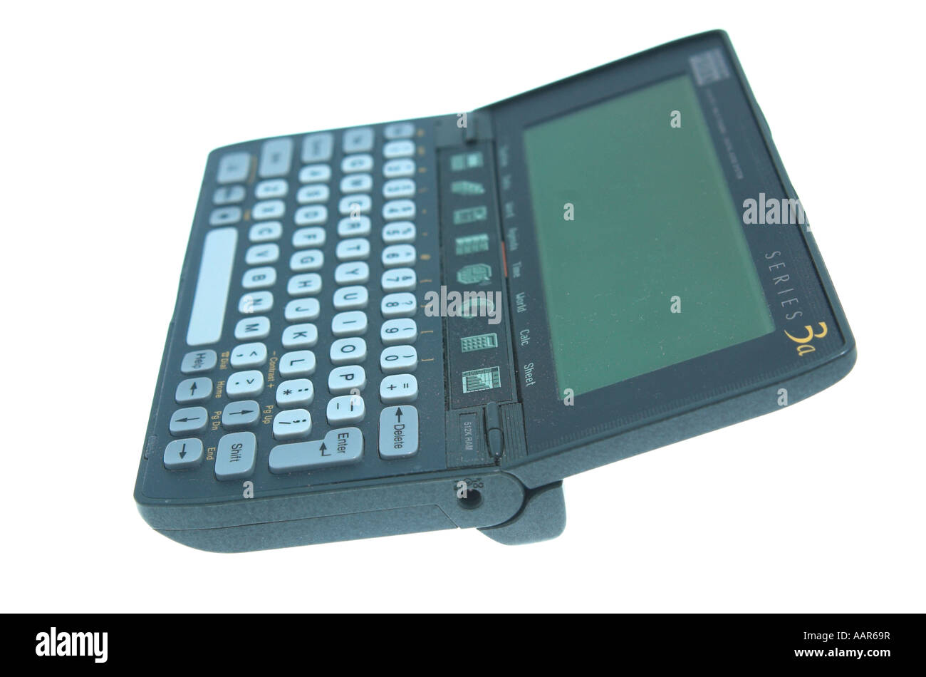 an open Psion displaying  screen and keyboard space bar Stock Photo
